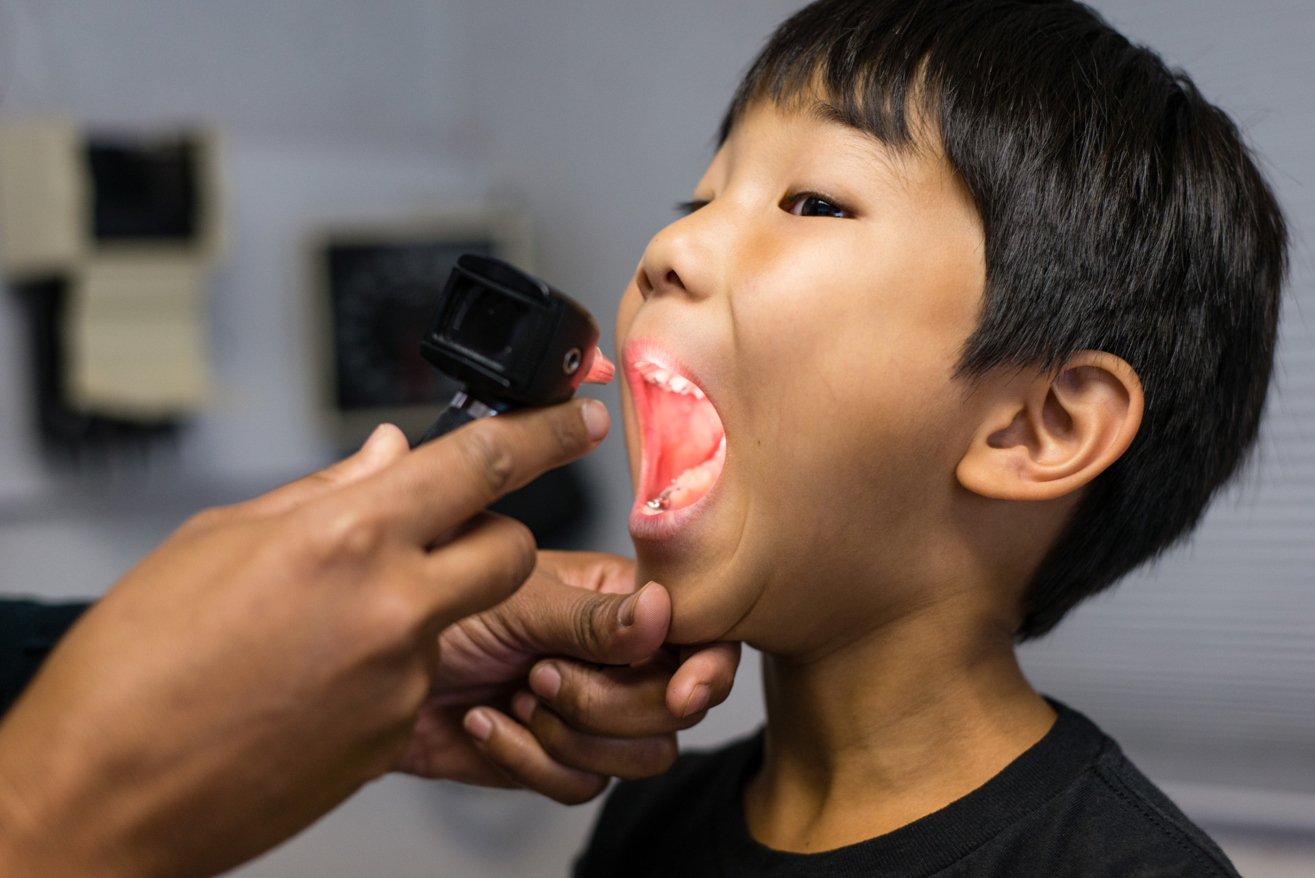 Daniel Lee, 5, gets his airway checked during his appointment at the Childrens Hospital of Orange County Breathmobile. Lee’s asthma symptoms prohibit him from playing soccer (Heidi de Marco/KHN)