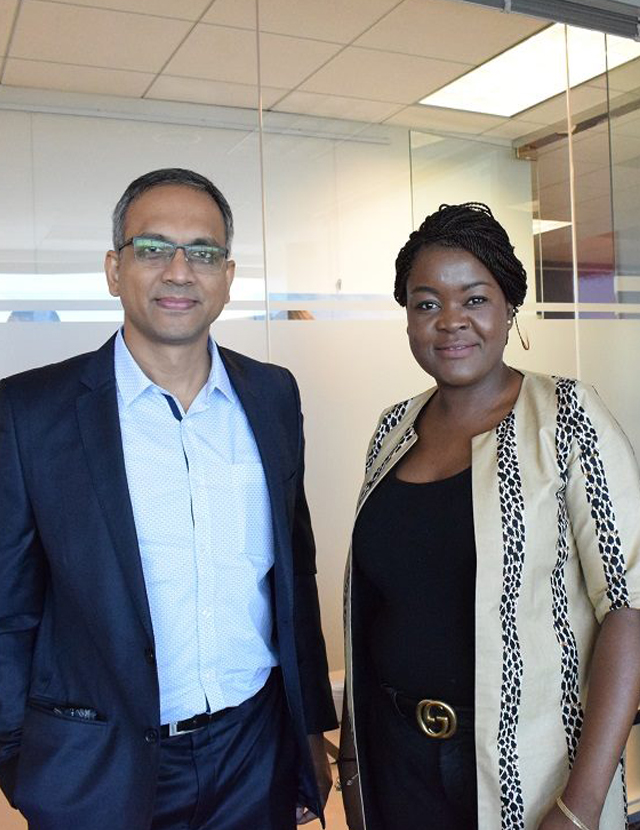 image: man and woman in PHI Central office