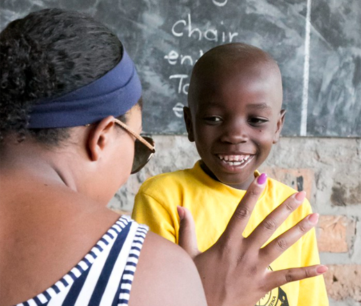 Woman and child in classroom