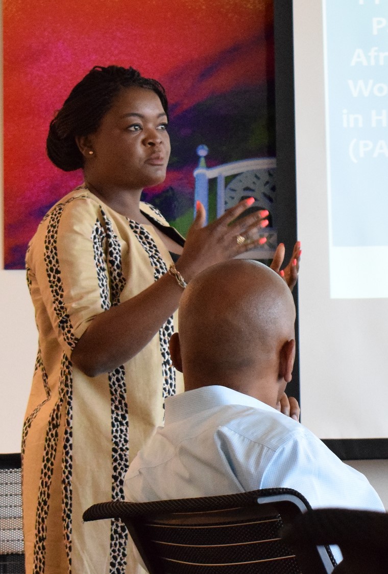 african american woman speaking to man