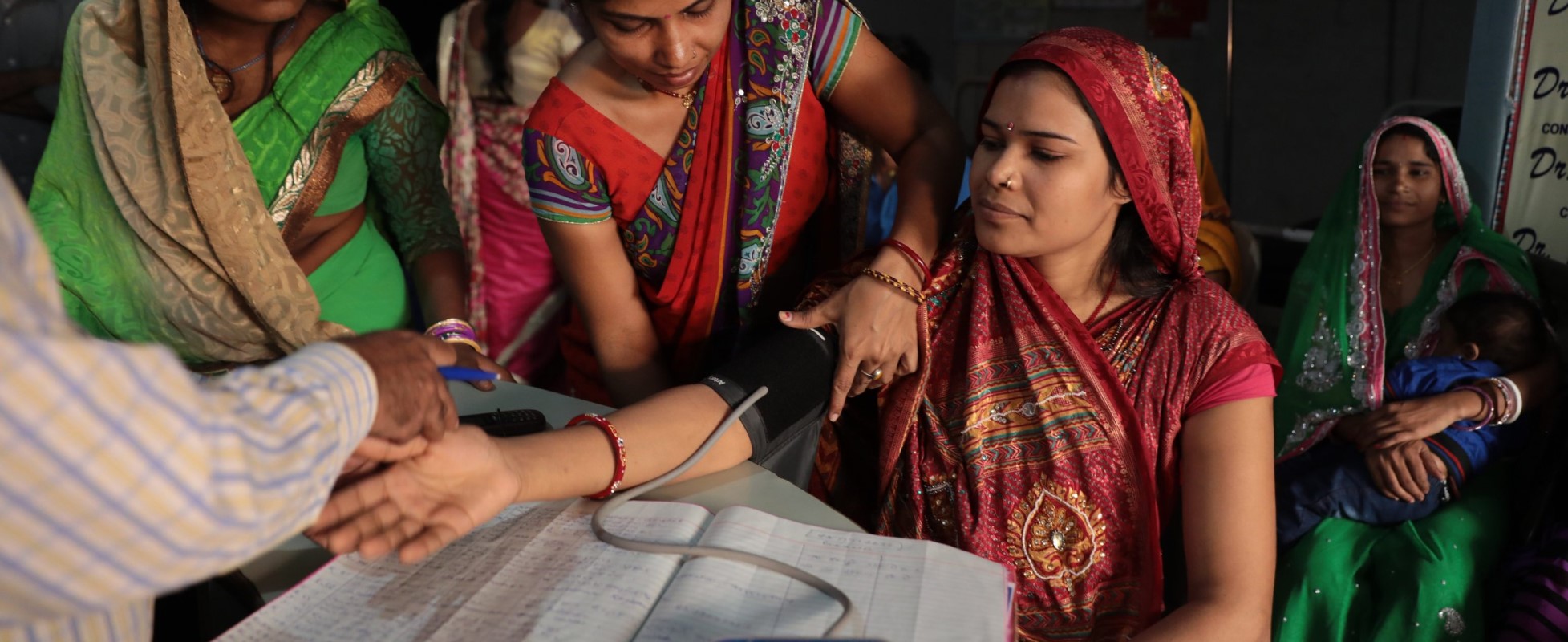 woman getting her blood pressure measured