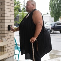 woman walking with cane