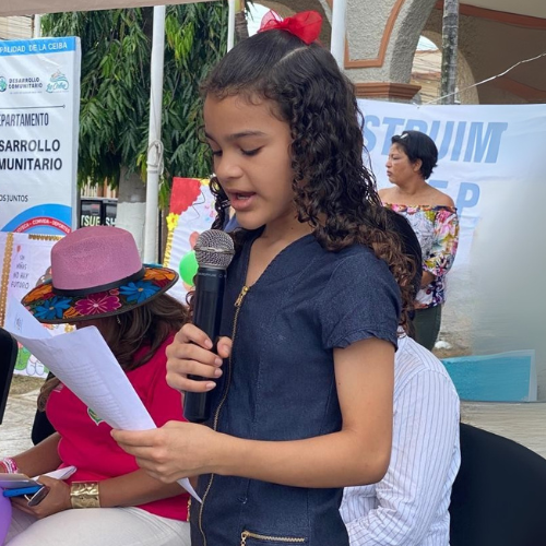 girl speaking in microphone