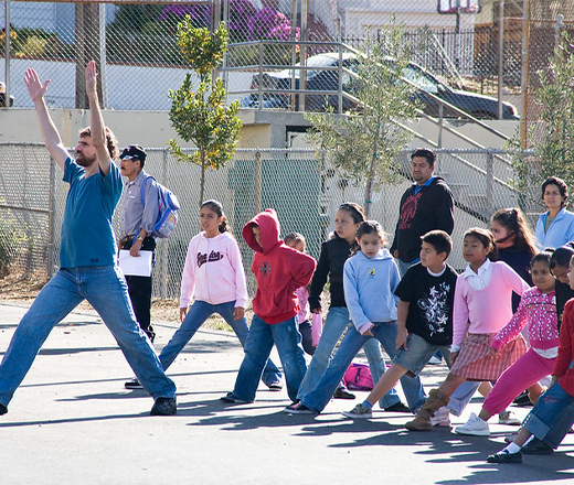 Children with doctor at school