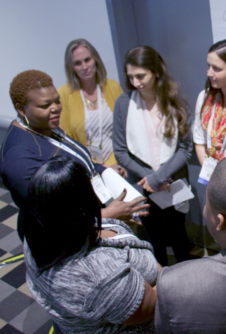 group of women listening to one speaker