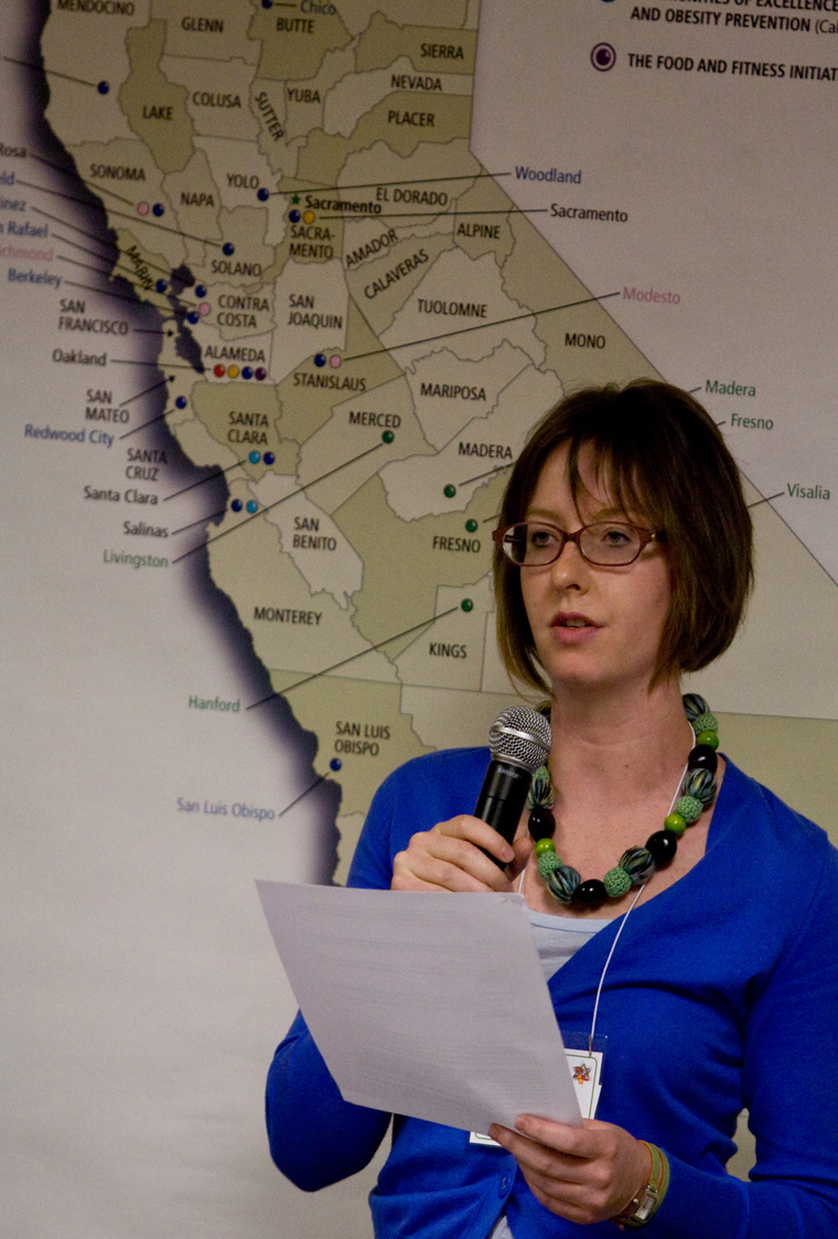 woman in front of map of California