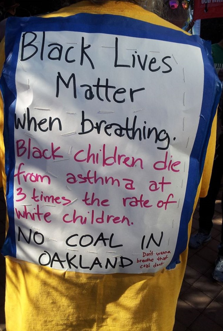 T-shirt with text that says "Black Lives Matter" when breathing. Black children die from Asthma at 3 times the rate of white children. NO COAL IN OAKLAND"