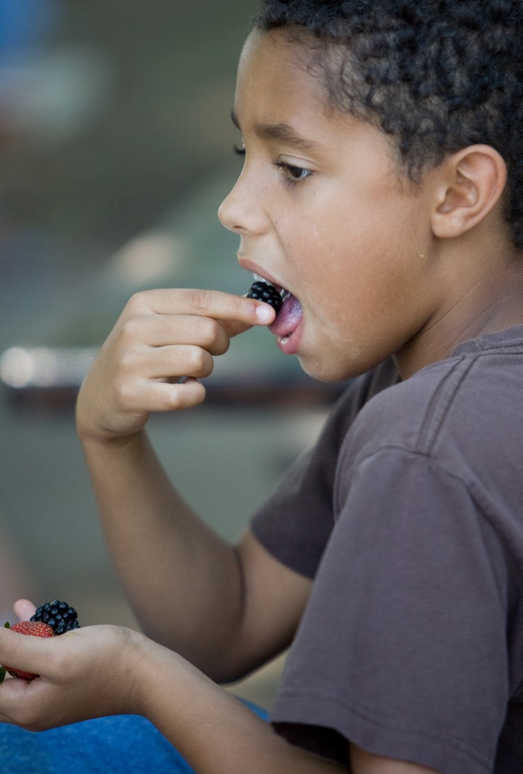 child eating a snack