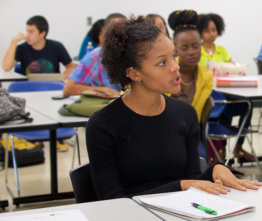 Woman in class at desk