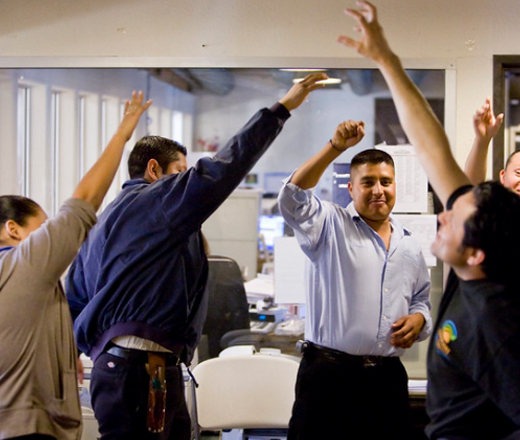 group of people giving a high five