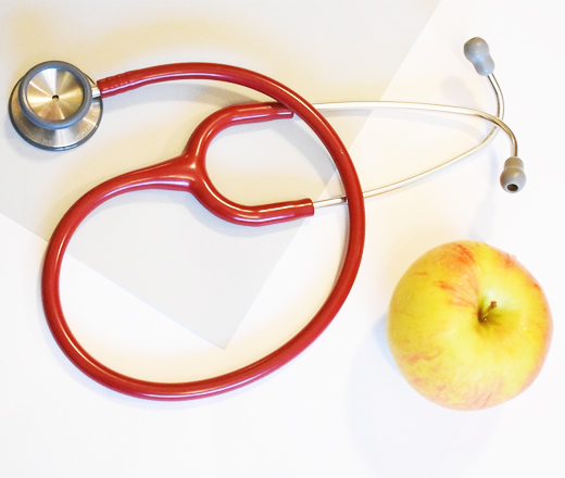 stethoscope and apple