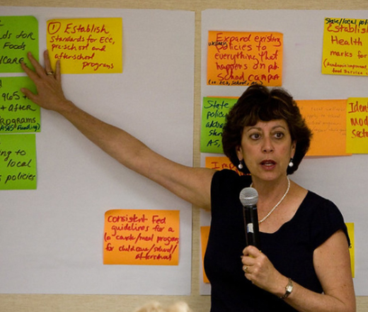 woman in front of whiteboard