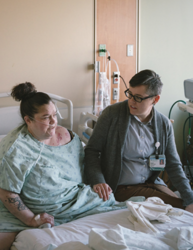 Hospital patient receiving consultation and care from a CA Bridge SUN staff