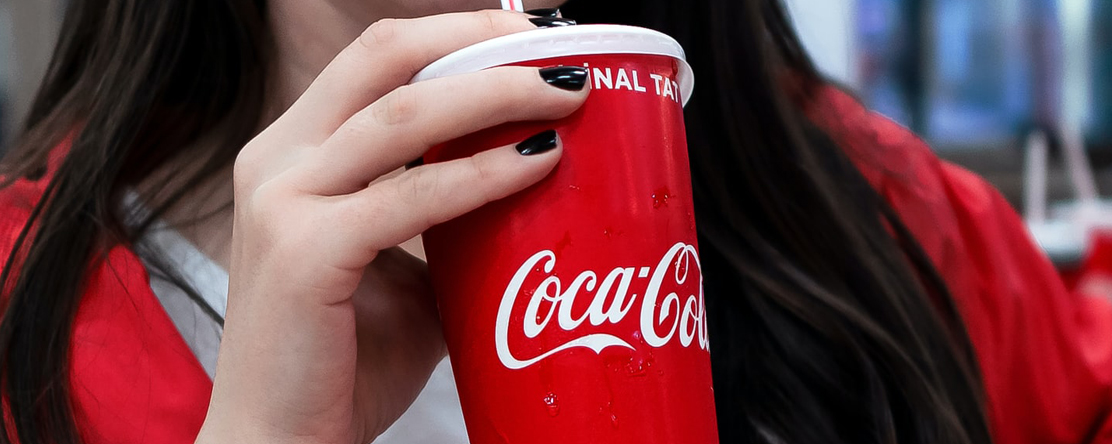 image: woman drinking soda