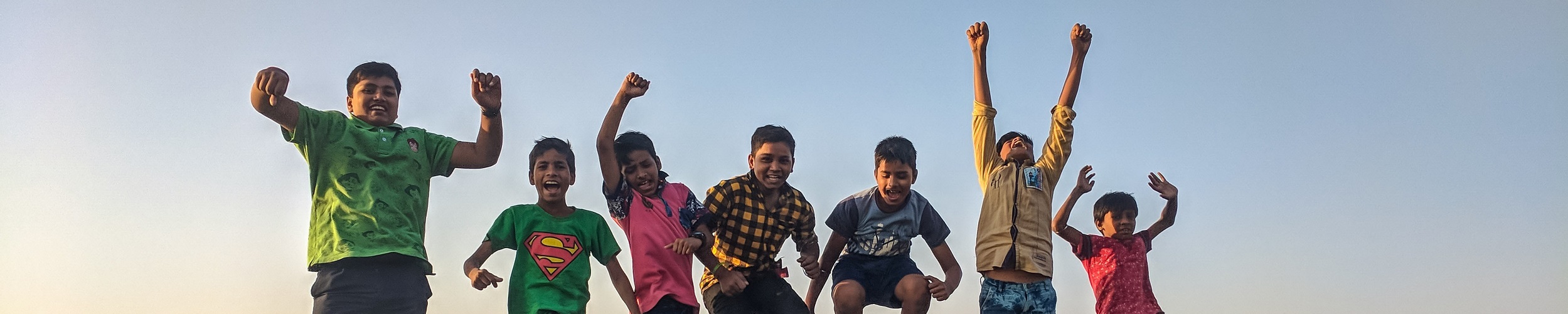 Children, mid-air, jumping
