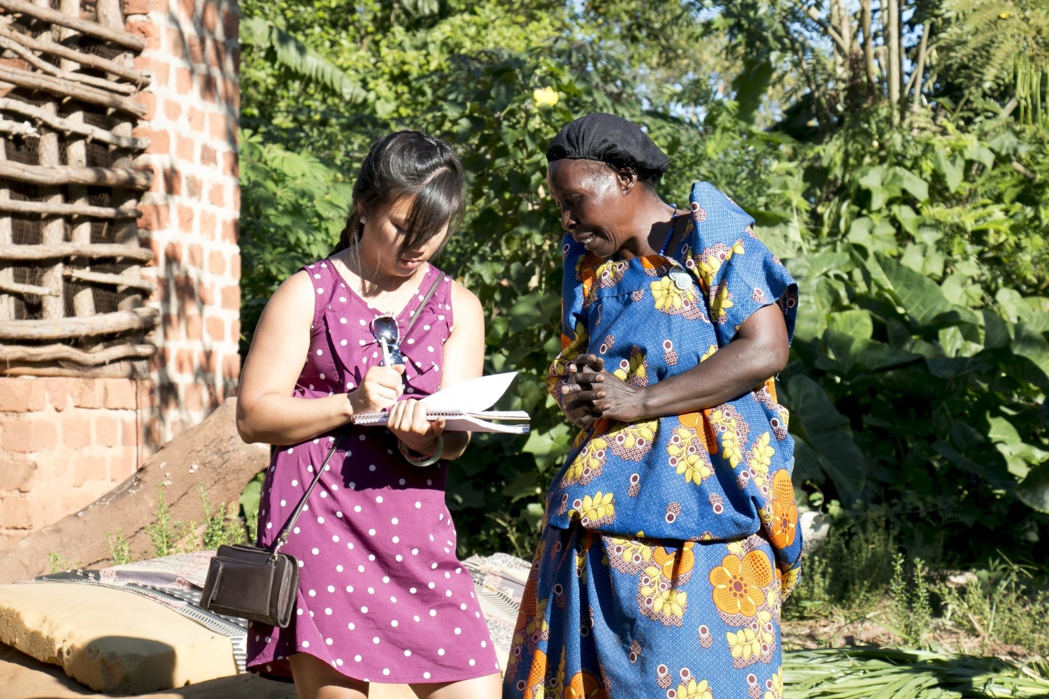 image: global health fellow with woman