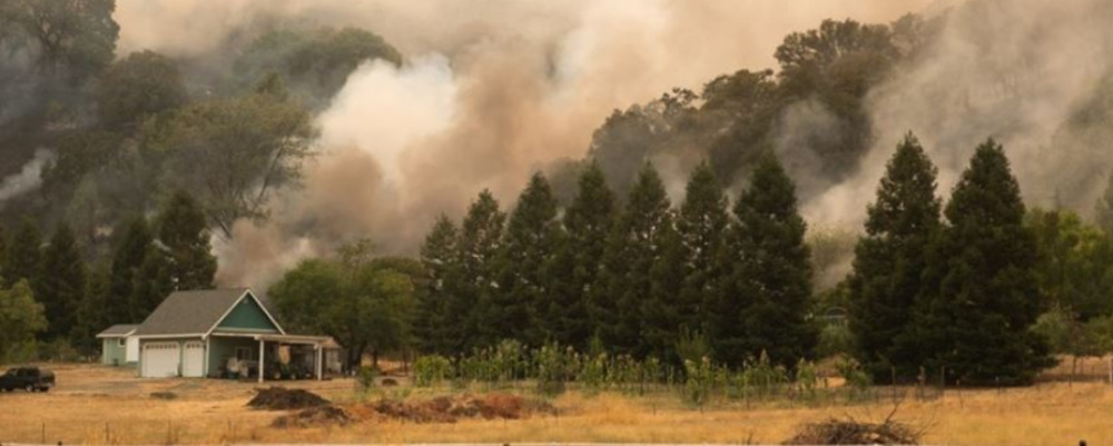 Fire burns on a hillside in Solano County on August 19, 2020.