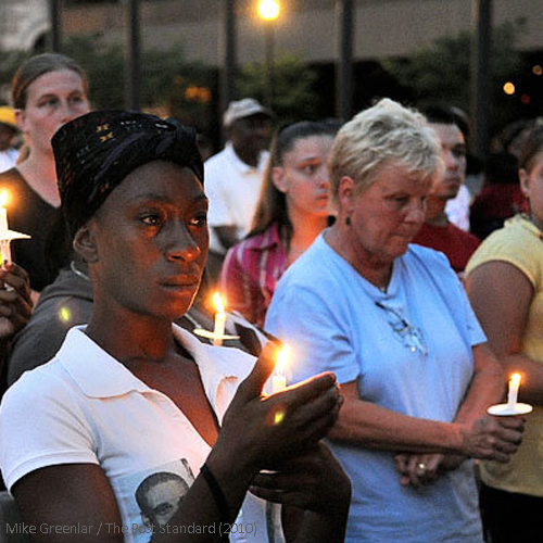 mothers attending Mothers Against Gun Violence candlelight vigil