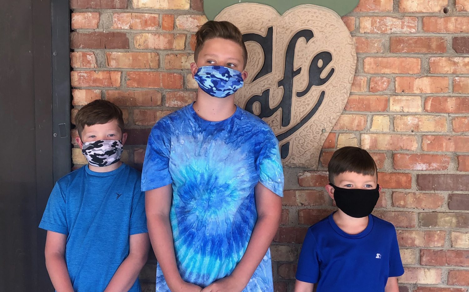 Audrey's boys wearing face masks