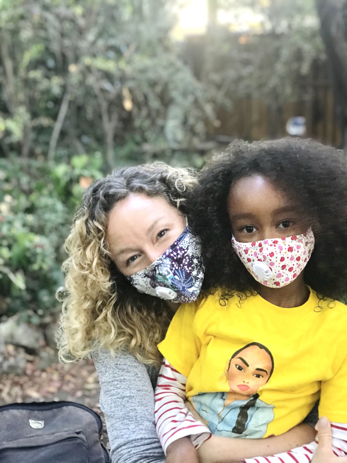 PHI's Skye and daughter wearing face masks