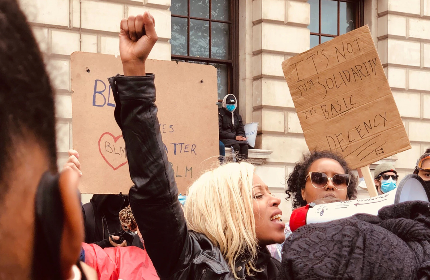 Woman holding megaphone at protest