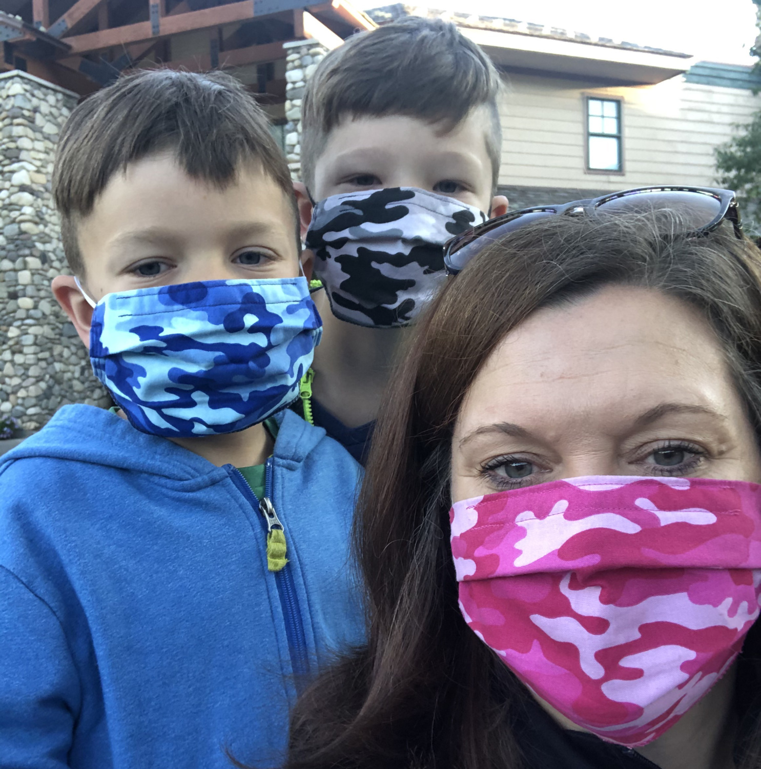Audrey and boys wearing face masks