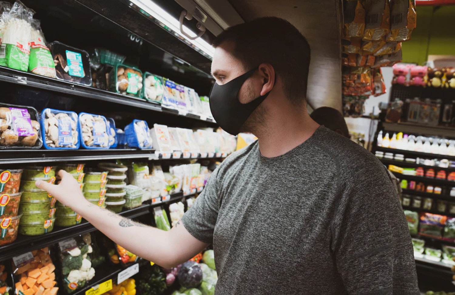 man buying groceries