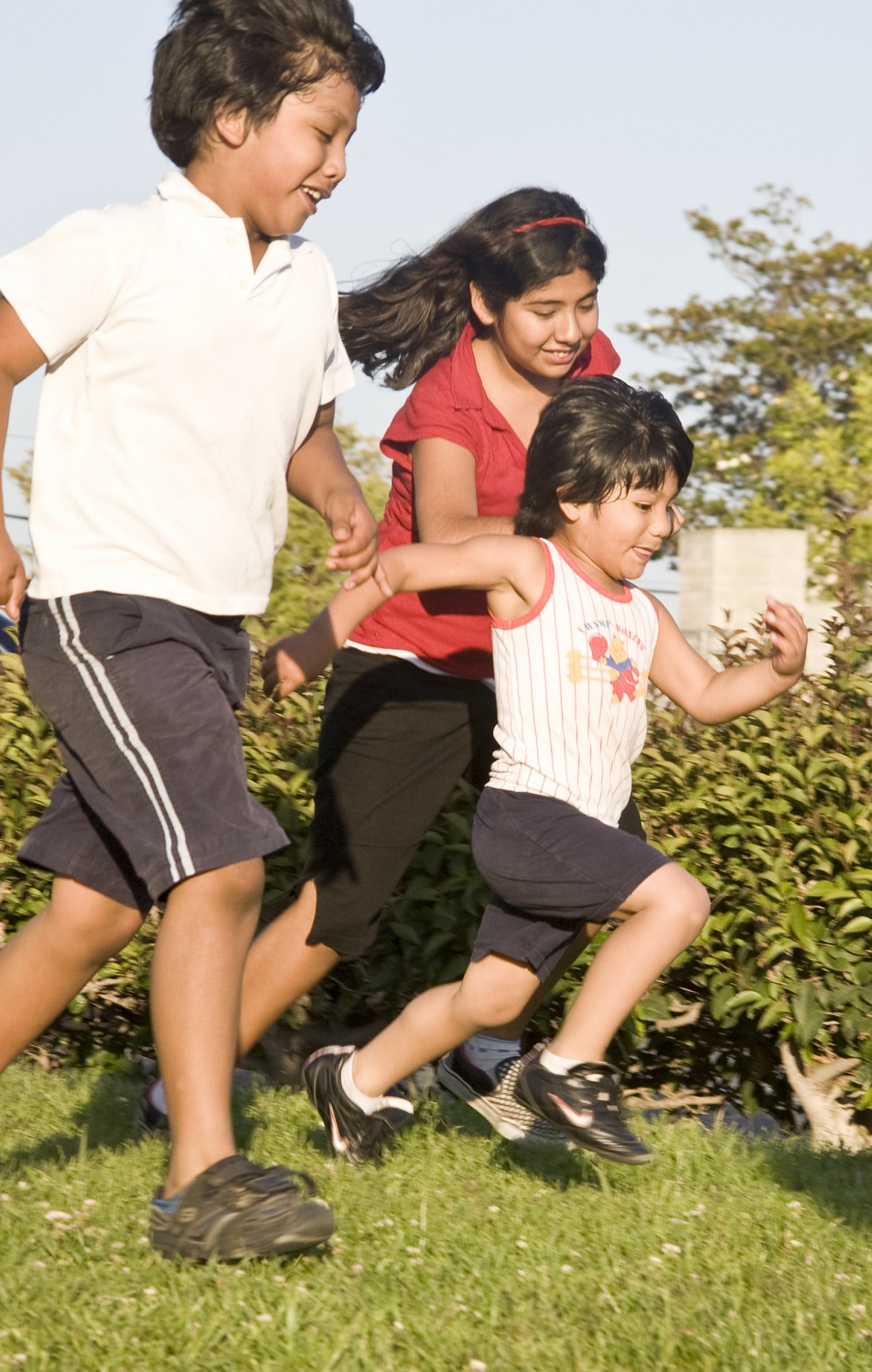 Kids running in a field