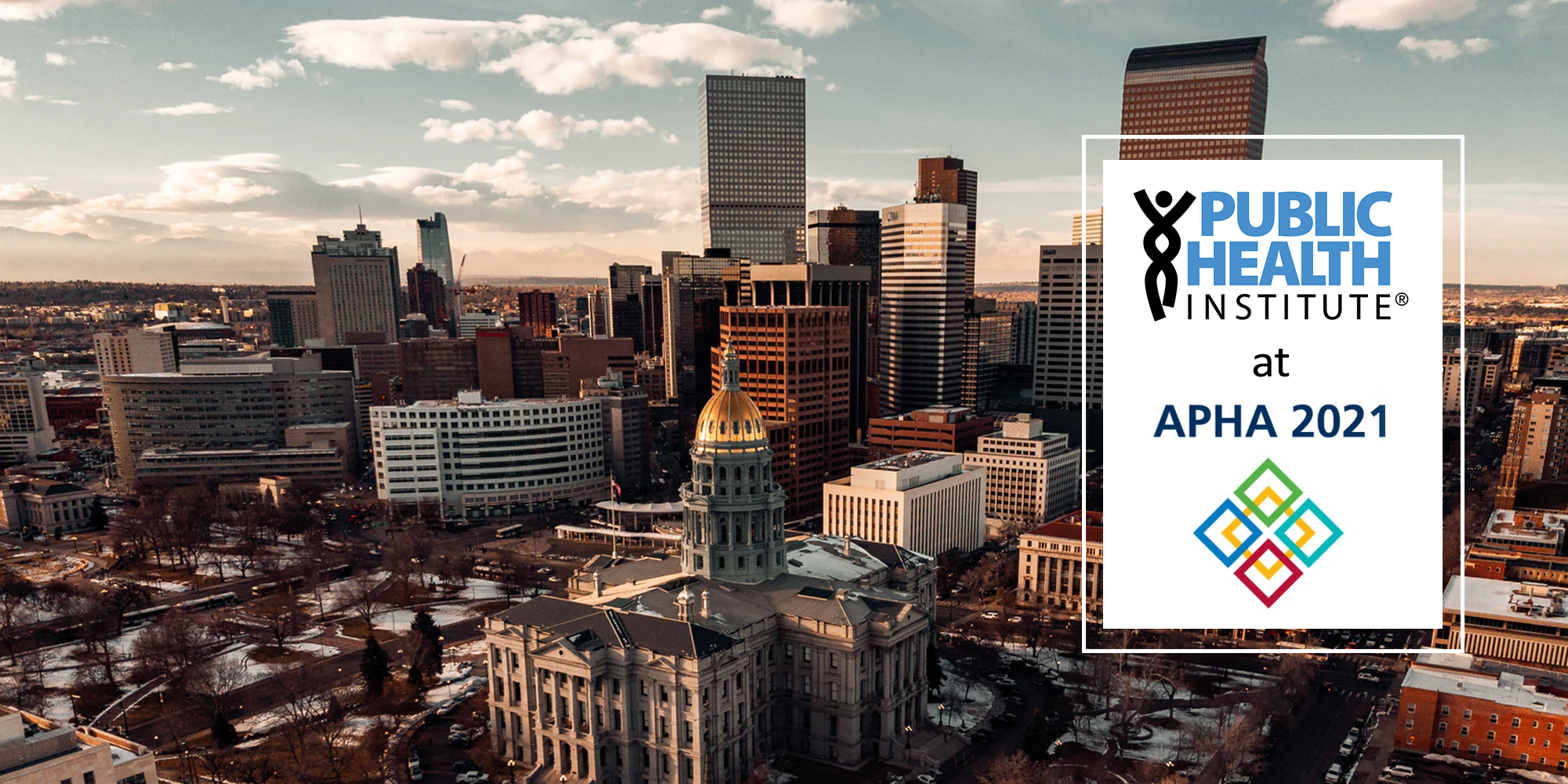 PHI at APHA with city of Denver skyline in the background