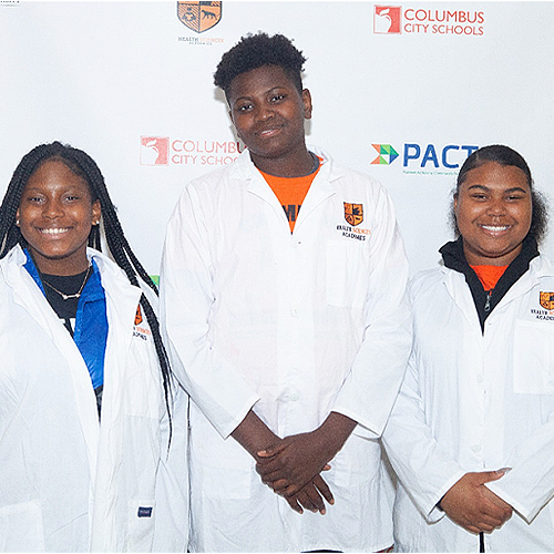 Students at their White Coat Ceremony, marking their transition into the Health Sciences Academies.