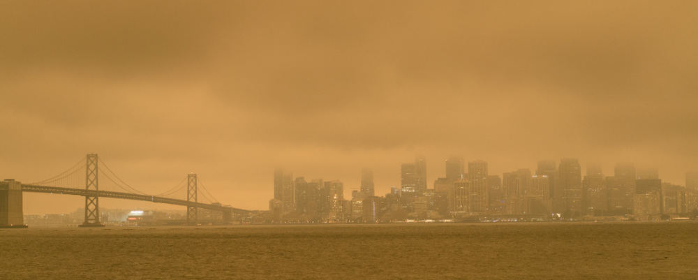 a very hazy, smoky day overlooking the Bay Bridge from Oakland