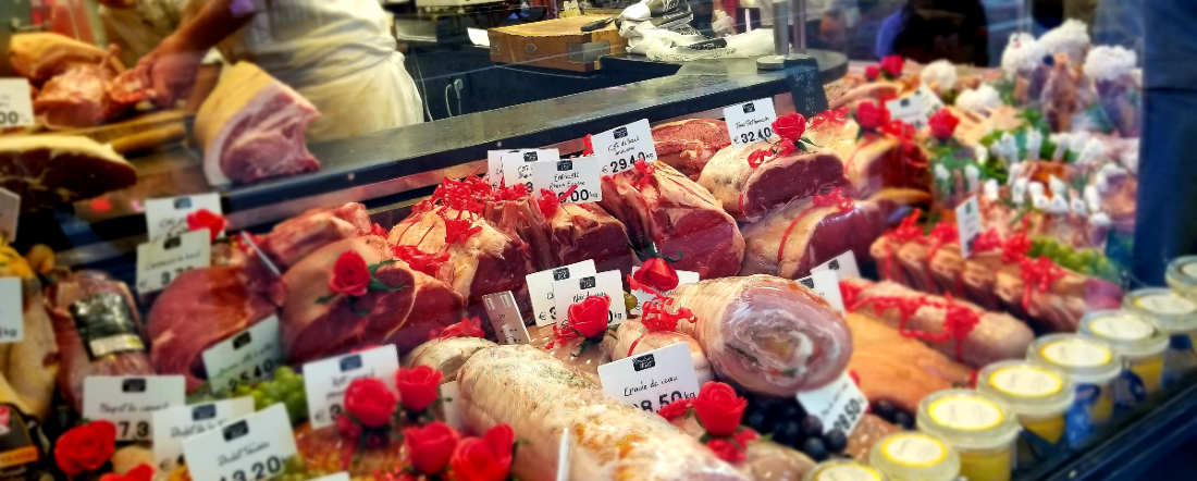 a meat display in a grocery case