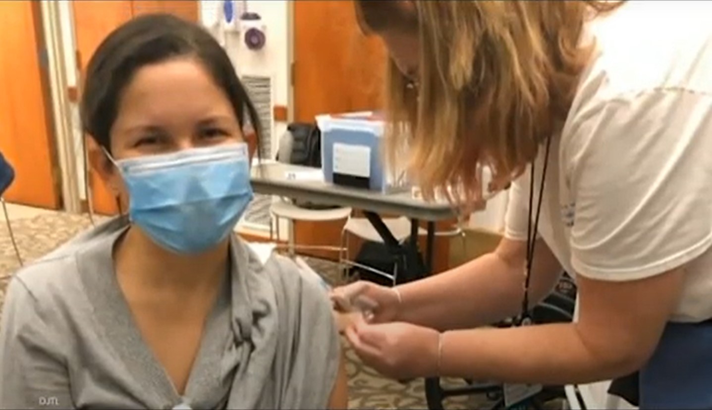 person getting vaccinated