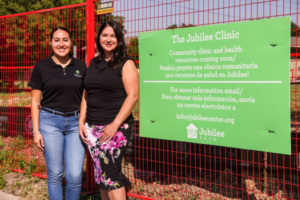 Alejandra Saldana, health and wellness manager, and Marissa Castro Mikoy, president and CEO, pose together in front where a new clinic that is being built at Jubilee Park and Community Center: Dallas Morning News photo