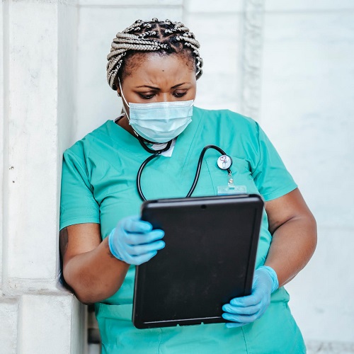 Doctor wearing scrubs and a face mask