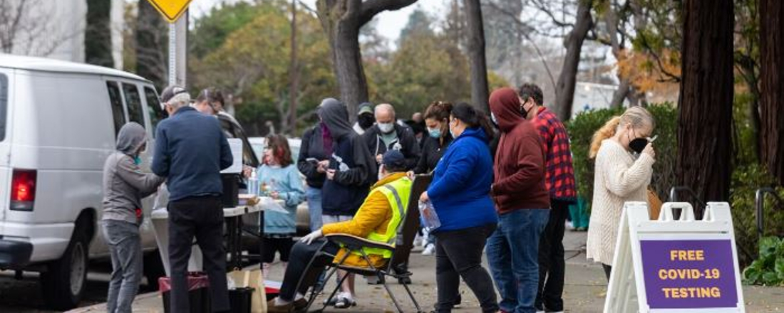 a line of people outside at a COVID testing site. credit: Kelly Franklin, Berkeleyside
