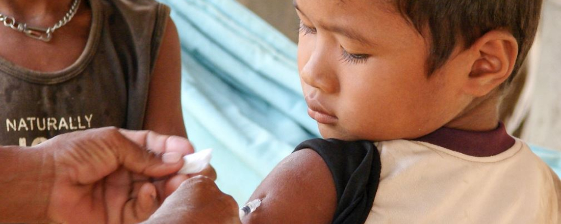 a child receiving a vaccination. CDC photo.