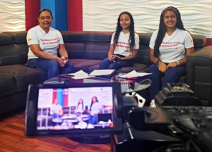 Three Girl Leaders speaking on Honduran television