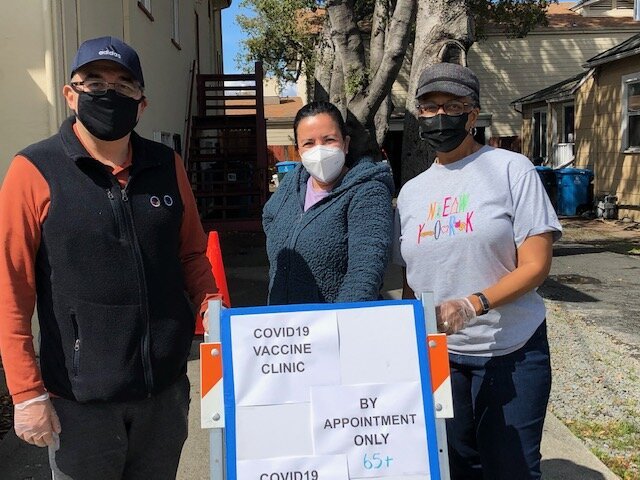 people outside of a vaccine clinic