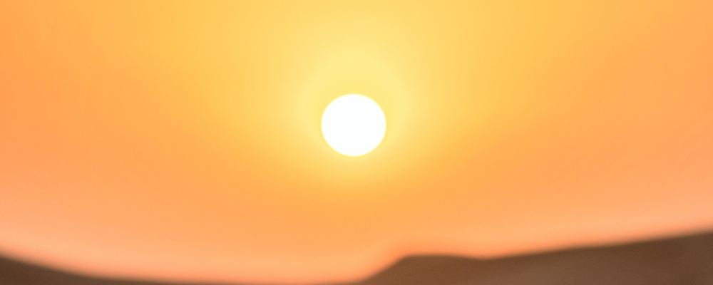 sun in horizon on a really hot day
