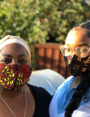 Two African American women wearing a mask during the COVID pandemic