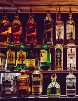 Alcohol bottles at a bar