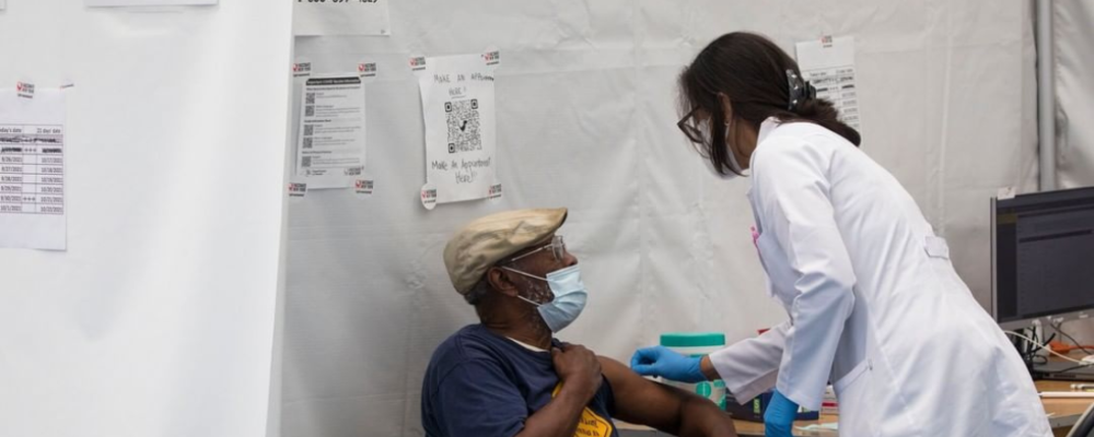 African American man getting COVID vaccine