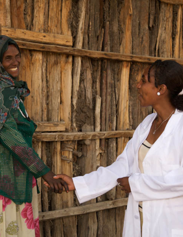 a public health professional visiting a community member