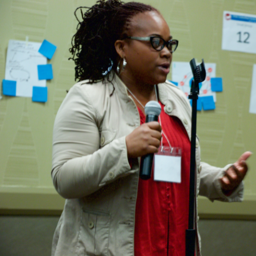 Woman speaking at a conference