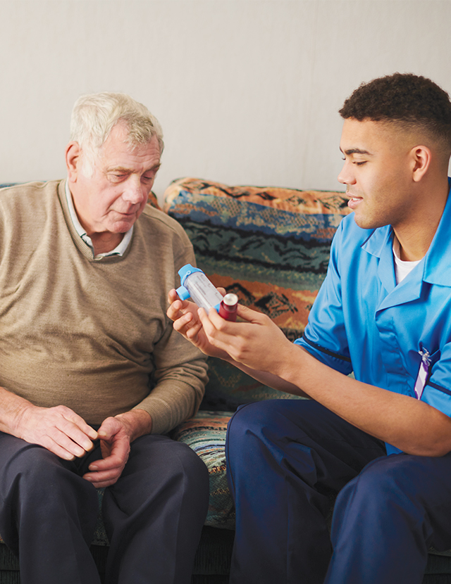 elderly man with inhaler