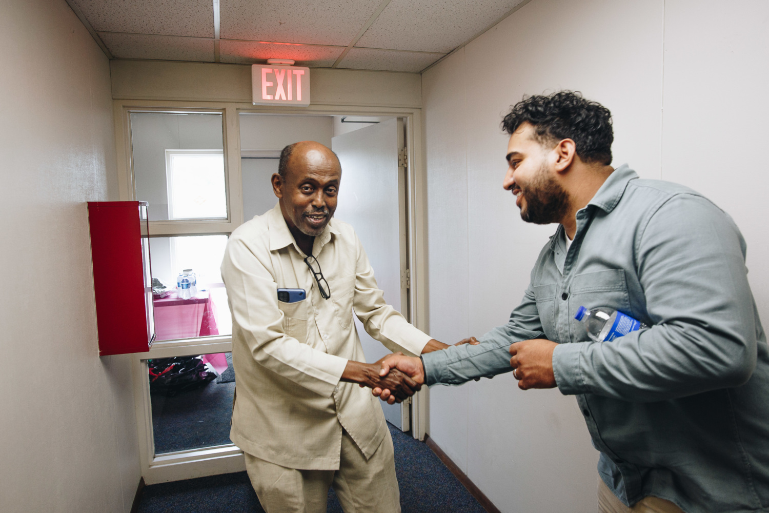 two men shaking hands