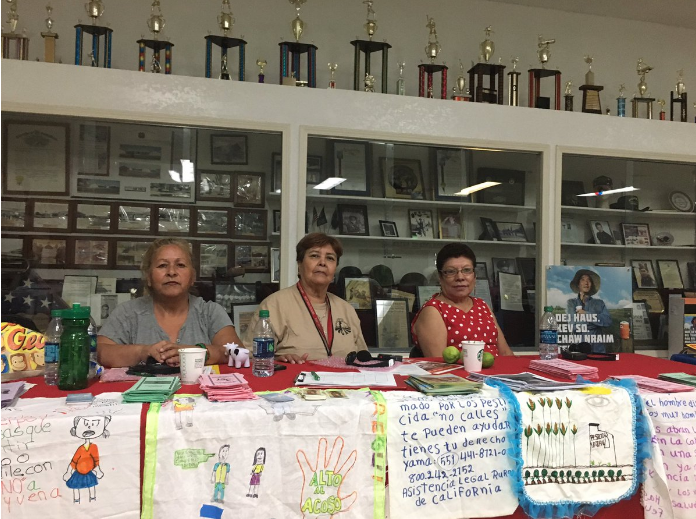 people sitting behind table