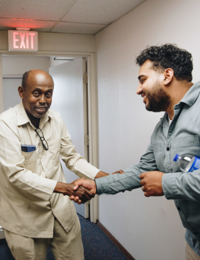 two men shaking hands