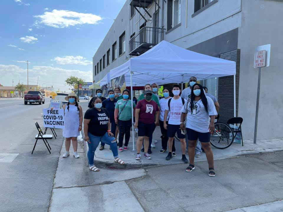 Community outreach workers working at a mobile COVID vaccine clinic